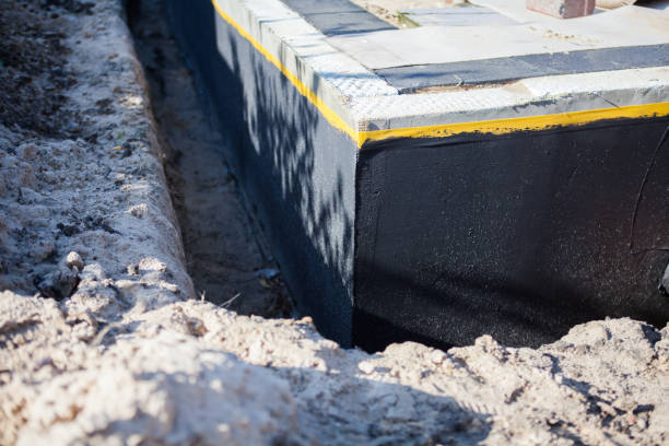 Professional Wet Basement Repair technician working in Dale, IN